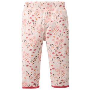 People wear organic Wendehose - puder AOP Winterblumen